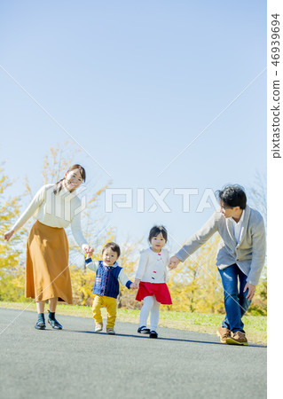 Four people playing in autumn park Four people playing in autumn park 46939694