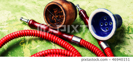 Smoking hookah with tobacco Smoking hookah with tobacco 46940151