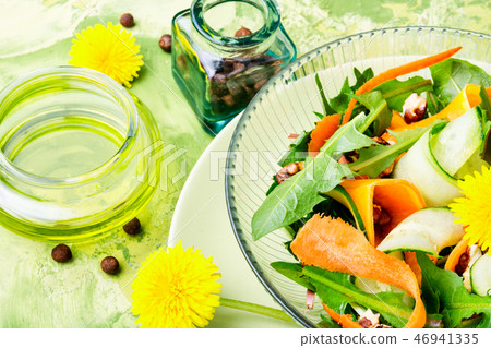 Salad of dandelion flowers 46941335