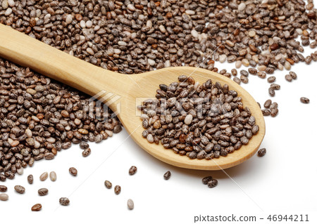 Chia seeds in bowl and wooden spoon 46944211
