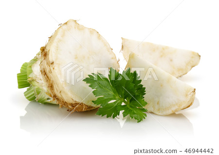 Fresh celery stalks and celeriac slices Fresh celery stalks and celeriac slices 46944442