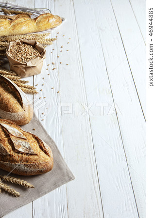Still life with bread, flour and spikelets Still life with bread, flour and spikelets 46944885
