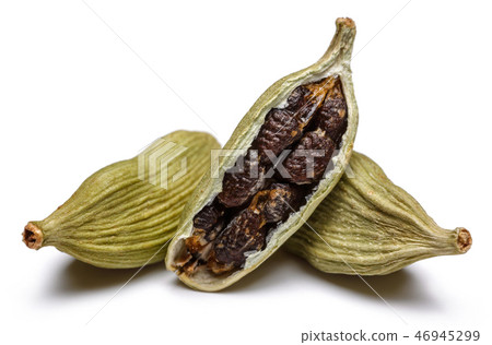 Green cardamom pods and seeds on white background Green cardamom pods and seeds on white background 46945299