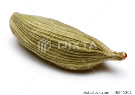 Green cardamom pod on white background. 46945301