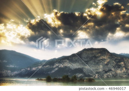 Dramatic sunset over Garda Lake in Italy Dramatic sunset over Garda Lake in Italy 46946017