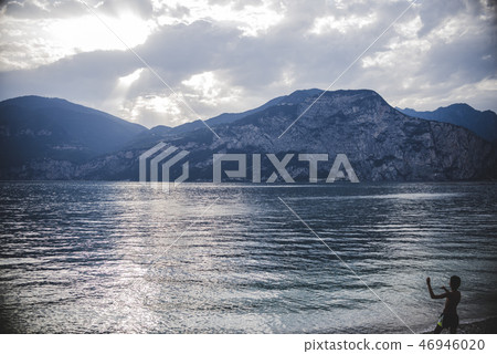 Dramatic sunset over Garda Lake in Italy Dramatic sunset over Garda Lake in Italy 46946020