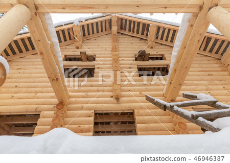 porch of a wooden house under construction 46946387