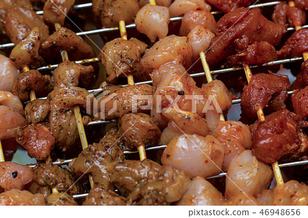 number of skewers with slices of meat sauce number of skewers with slices of meat sauce 46948656