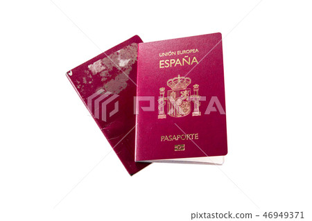 New spanish passport over old rusty expired one, white background New spanish passport over old rusty expired one, white background 46949371