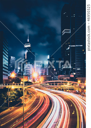 Street traffic in Hong Kong at night Street traffic in Hong Kong at night 46950325