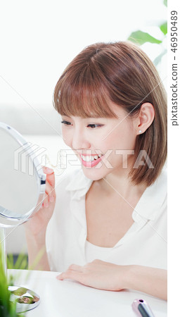 woman with retainer for teeth 46950489