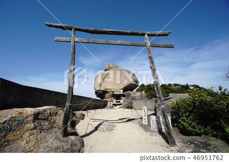 Heavy rock and torii of Oze Ishigamo Shrine 46951762