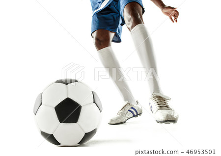 Legs Of Soccer Player Close Up Isolated On White Stock Photo