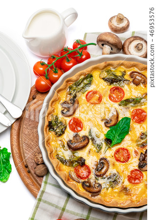 Baked homemade quiche pie in ceramic baking form Baked homemade quiche pie in ceramic baking form 46953576