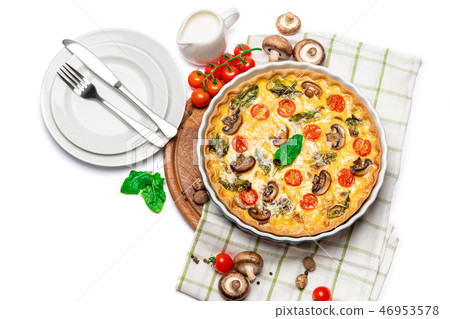 Baked homemade quiche pie in ceramic baking form Baked homemade quiche pie in ceramic baking form 46953578