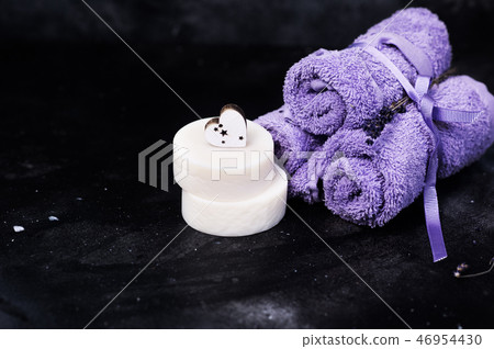 Spa and wellness setting with lavender flowers and handmade soap or shampoo bar, Dayspa nature set 46954430