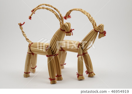 two traditional christmas straw goats on white 46954919