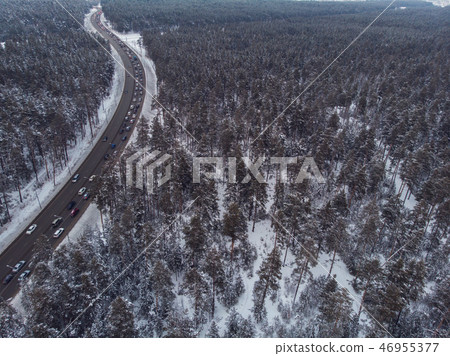 Aerial view of a winter road 46955377