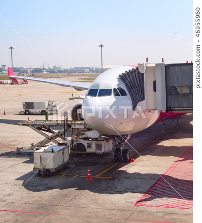 Gangway to airplane at runway 46955960