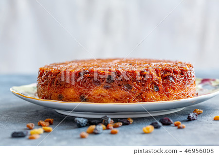 Homemade noodle Kugel in sugar caramel. Homemade noodle Kugel in sugar caramel. 46956008