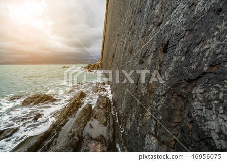 Coast of black sea. Rock of the Kisilev at sunset. Coast of black sea. Rock of the Kisilev at sunset. 46956075