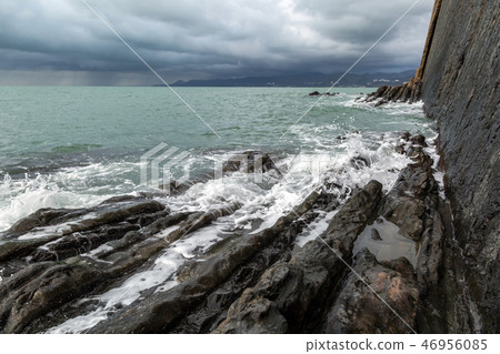 Coast of black sea. Rock of the Kisilev in stormy weather. Coast of black sea. Rock of the Kisilev in stormy weather. 46956085