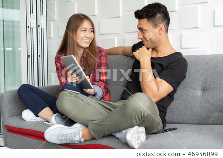 couple are using digital tablet couple are using digital tablet 46956099