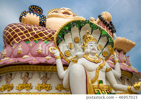 Giant Budai or Pu-Tai or Happy Buddha or Laughing Big Buddha statue at Wat Plai Laem Temple in the Giant Budai or Pu-Tai or Happy Buddha or Laughing Big Buddha statue at Wat Plai Laem Temple in the 46957015