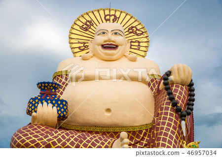 Giant Budai or Pu-Tai or Happy Buddha or Laughing Big Buddha statue at Wat Plai Laem Temple in the 46957034
