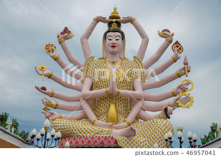 Big Statue of Shiva many hands in Wat Plai Laem Temple on Koh Samui island in Thailand Big Statue of Shiva many hands in Wat Plai Laem Temple on Koh Samui island in Thailand 46957041