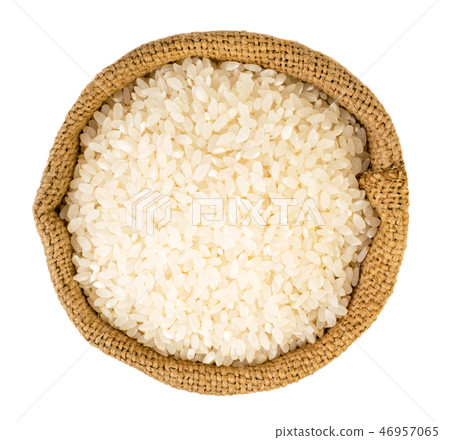 Rice in a bag on a white. The view from the top. 46957065