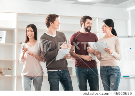 Joyful young team working together 46960659