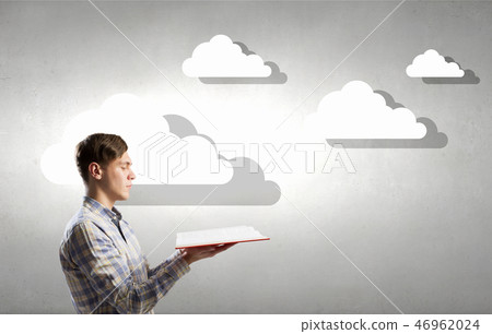Man reading red book Man reading red book 46962024