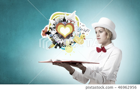 Pretty woman opening romantic book Pretty woman opening romantic book 46962956