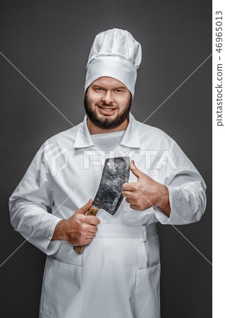 Smirking chef with sharp knife Smirking chef with sharp knife 46965013