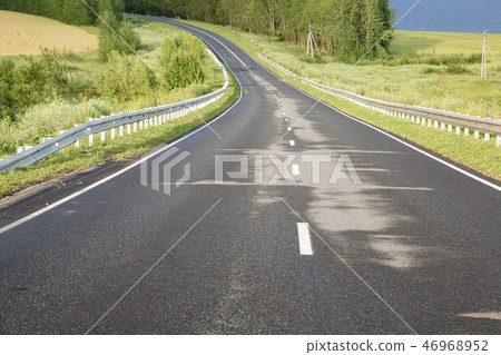 wet asphalt road after a rain wet asphalt road after a rain 46968952