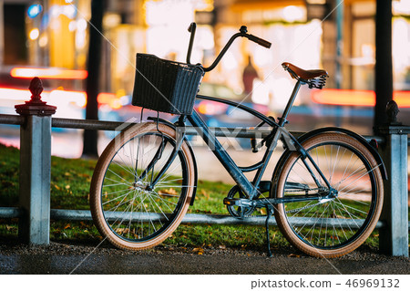 Bicycle Equipped Basket Parked In European City Street In Night  46969132