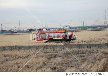 Winter work of rice fields, spraying of soil conditioner Winter work of rice fields, spraying of soil conditioner 46969692