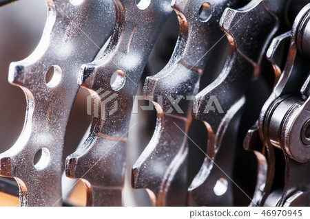 Bike cassettes. Silver stars and chains. Driving s 46970945