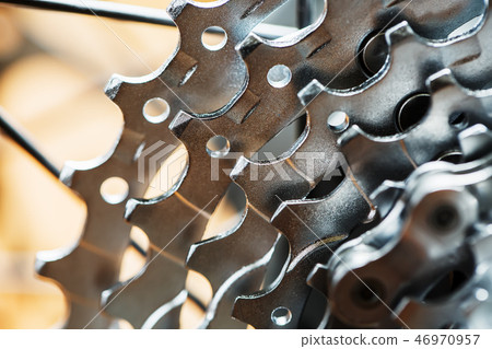 Bike cassettes. Silver stars and chains. Driving s 46970957