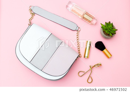 feminine accessories on pink background. Flat lay feminine accessories on pink background. Flat lay 46971502