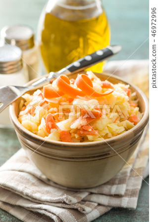 Bowl of coleslaw. 46972996