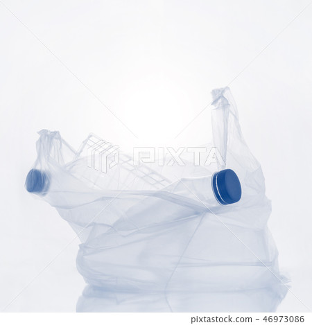Various plastic garbage on the light background 46973086