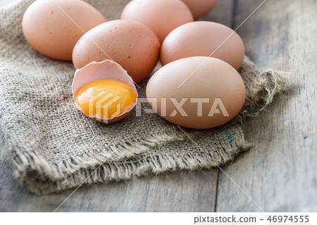 Fresh eggs on the wooden floor 46974555