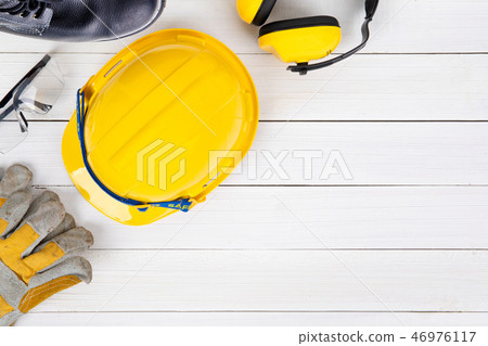 Banner image of construction safety equipment flat lay on white 46976117