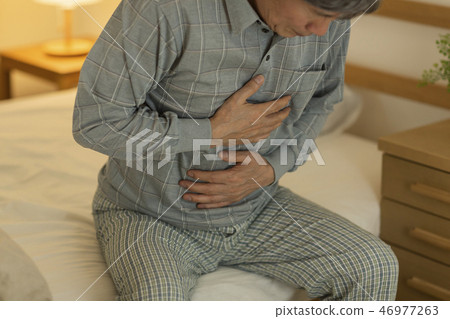 Senior man unwell Senior man unwell 46977263