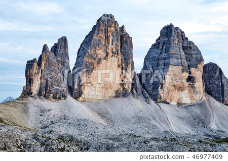 Tre Cime di Lavaredo mountains at daylight 46977409