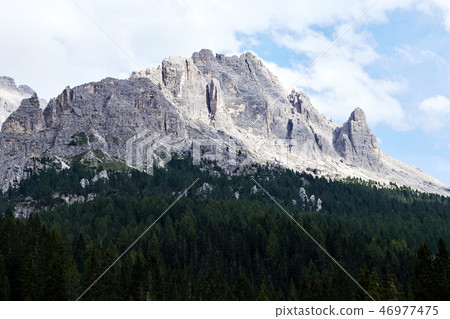 Mountains covered in snow near Lake Antorno 46977475