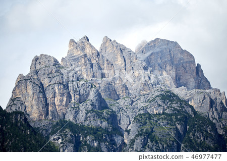 Mountains covered in snow near Lake Antorno 46977477