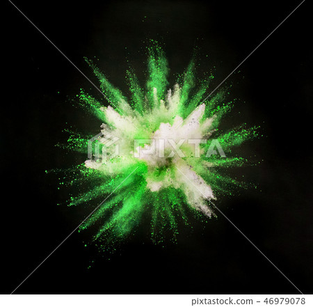 Colored powder explosion on black background. 46979078